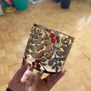 Gold Floral Cutout candle holder with Red Glitter Accents